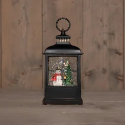 Anna's Collection automatische sneeuwbol lantaarn sneeuwpop zwart met verlichting 11 x 15,5 x 27 cm