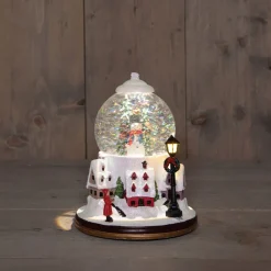 Anna's Collection automatische sneeuwbol dorp sneeuwpop met verlichting D 18,5 H 24,5 cm