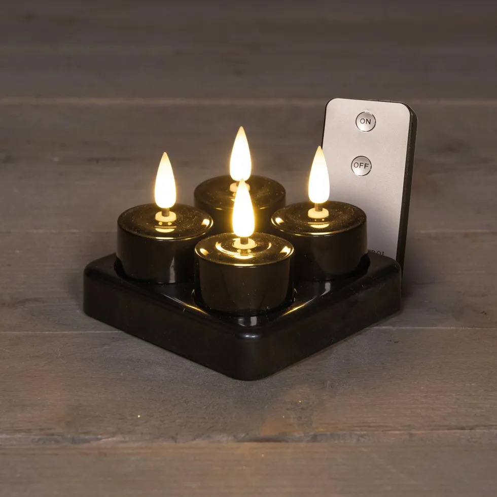 Anna's Collection LED waxinelicht met oplaadstation zwart D 3,5 H 1,5 cm 4 stuks
