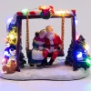 Intratuin kerstdorpminiatuur kerstman en kerstvrouw op schommel 11 x 6 x 8 cm