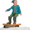 Intratuin kerstdorpminiatuur kind op skateboard 6,5 x 3,5 x 6,5 cm