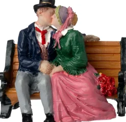 Intratuin kerstdorpminiatuur kus op bankje 6,1 x 3,1 x 5,9 cm