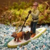 Luville kerstdorpminiatuur paddle boarding (mensen suppen) 7,5 x 5 x 10 cm 2-delig