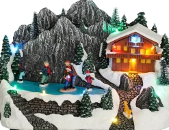 Luville Specials kerstdorp scenery with skaters (schaatsers bij bergen) 31 x 21 x 19 cm